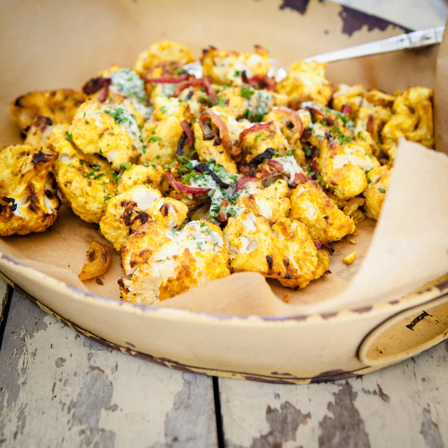 ROAST TANDOORI CAULIFLOWER WITH CREAMY COCONUT MINT DRESSING