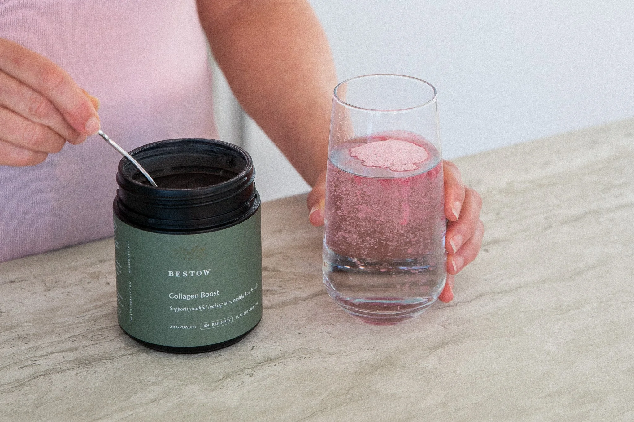 Landscape putting Collagen in glass.jpg