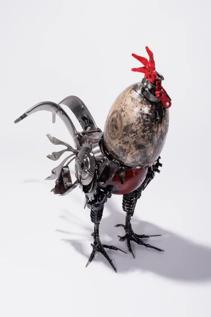 "Globe Cup Rooster" sculpture