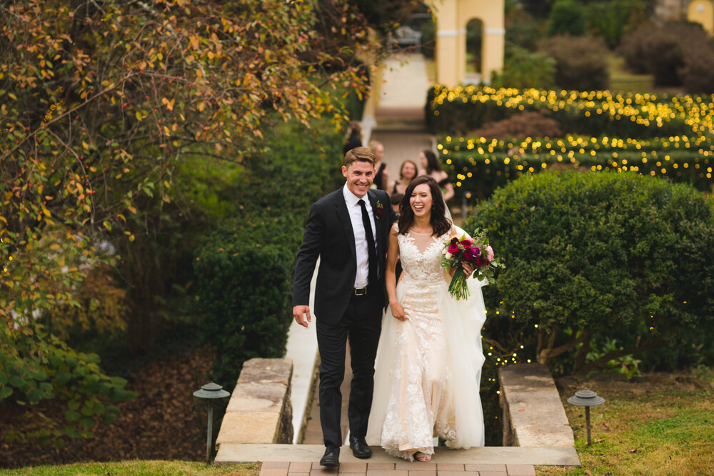 airlie-warrenton-just-married-bride-groom-walking-picture-by-Gabriele-Stonyte-Photography