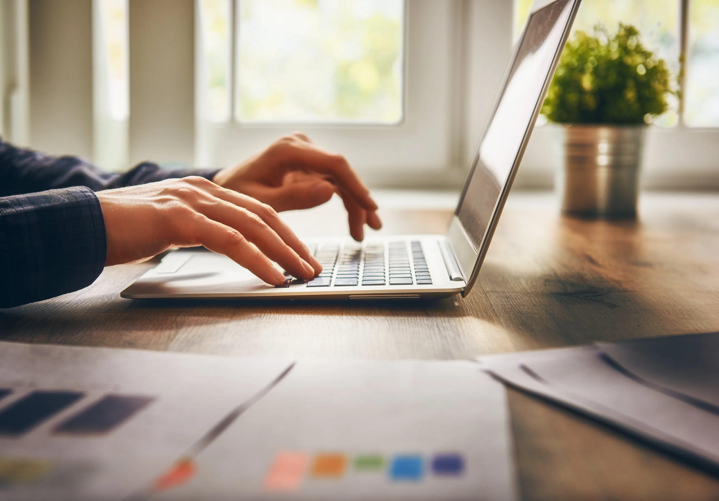 businessman-using-laptop-PV9C76B.jpg