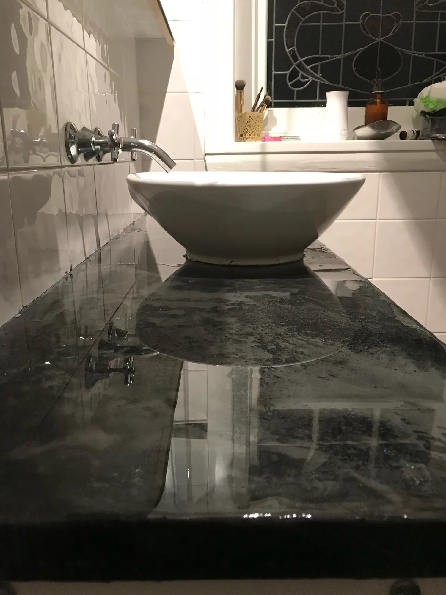 Polished black Venetian plaster bathroom