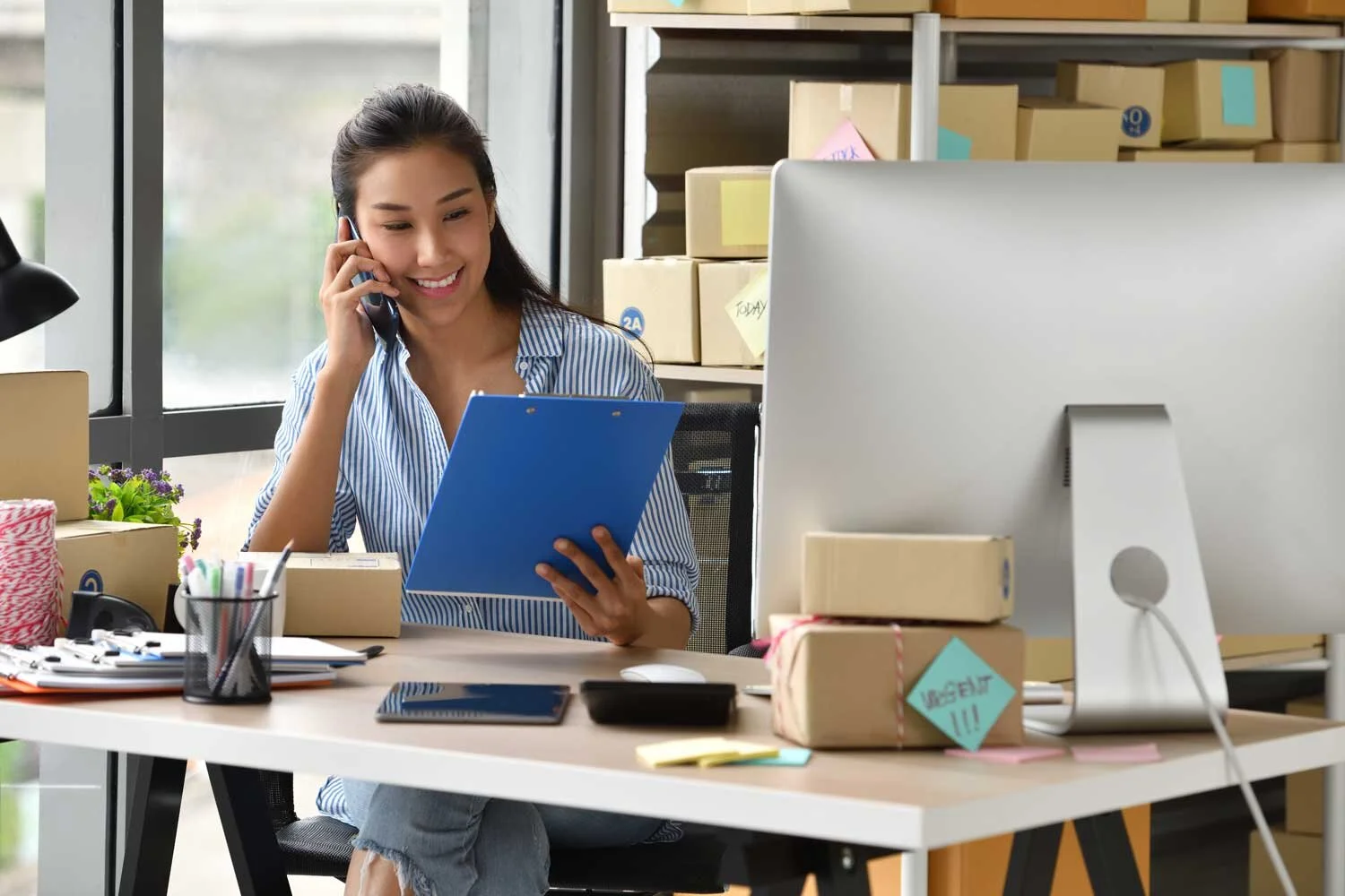 young-asian-woman-entrepreneur-business-owner-working-with-computer-home.jpg