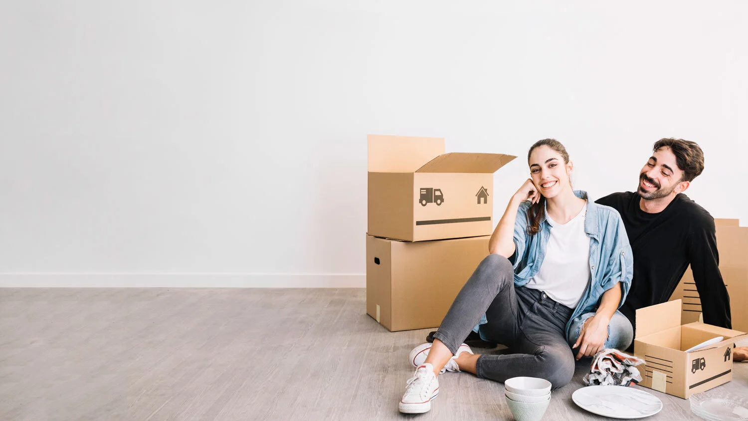 couple-sitting-floor-new-flat.jpg