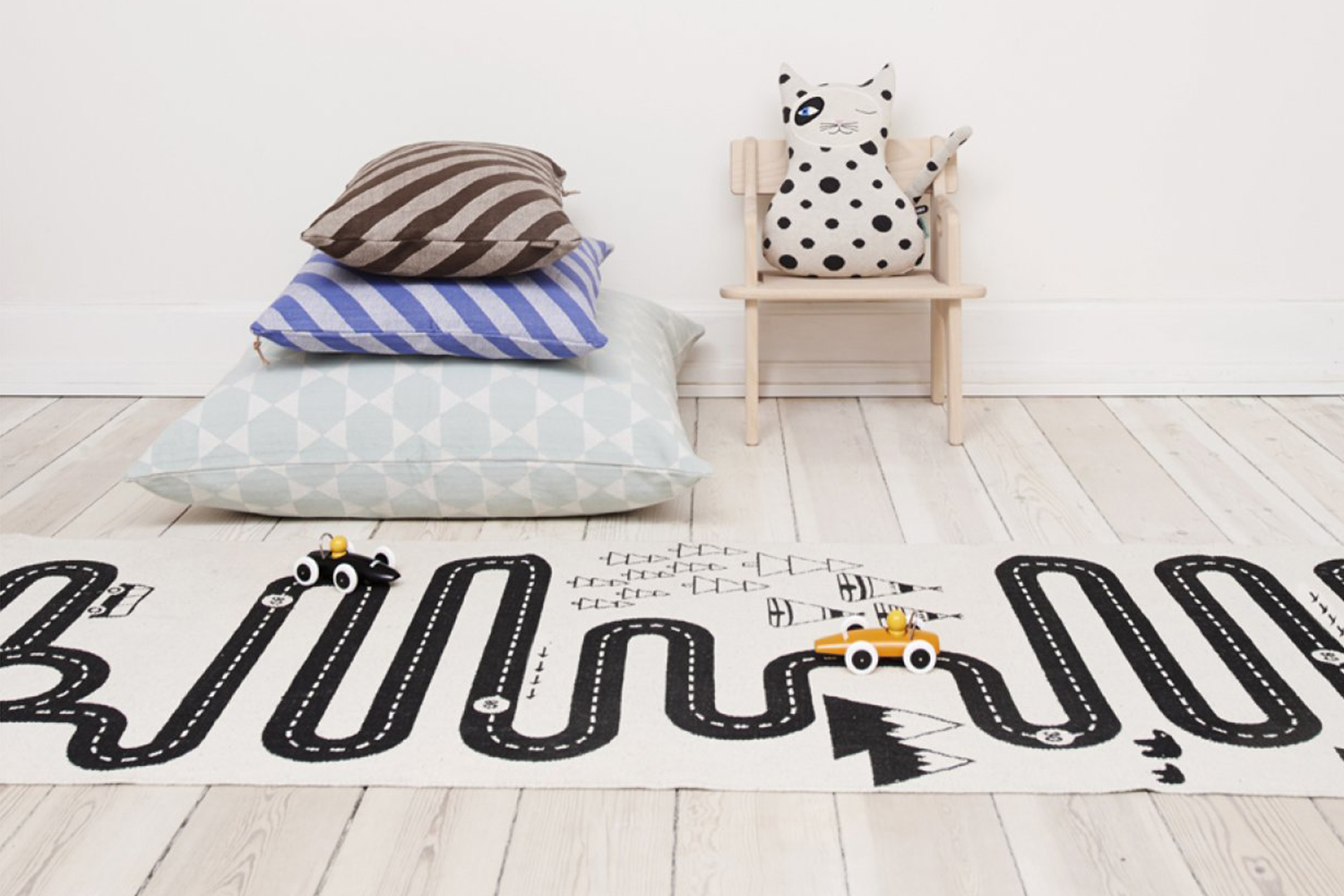  The playful Circuit Adventure rug, designed by OYOY and sold by  Les Enfants du Design . 