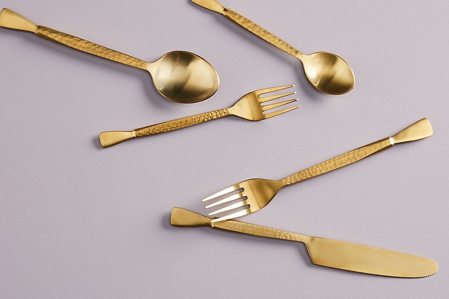  The shinny Hammered Golden Flatware by  Anthropologie . 