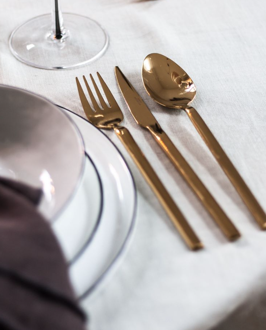   Cutlery Tvis Rose Gold ,  Dinner Plate Salt ,  Side Plate Salt , and  Deep Dish Nordic Sand  all created by  Broste Copenhagen.   