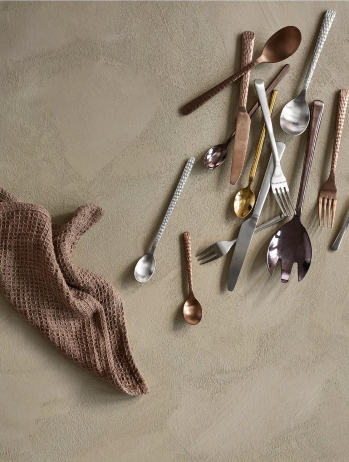   Hammered Cutlery Hune ,  Hammered Cutlery Stain Steel ,  Salad Serving Set Hune,   Cutlery Hune Stain Steel ,  Teaspoon Tvis Stainless Steel , and  Dishcloth Iris Linen  all created by  Broste Copenhagen.   