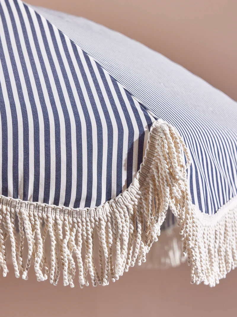 wooden-parasol-scalloped-edge-fringed-detail