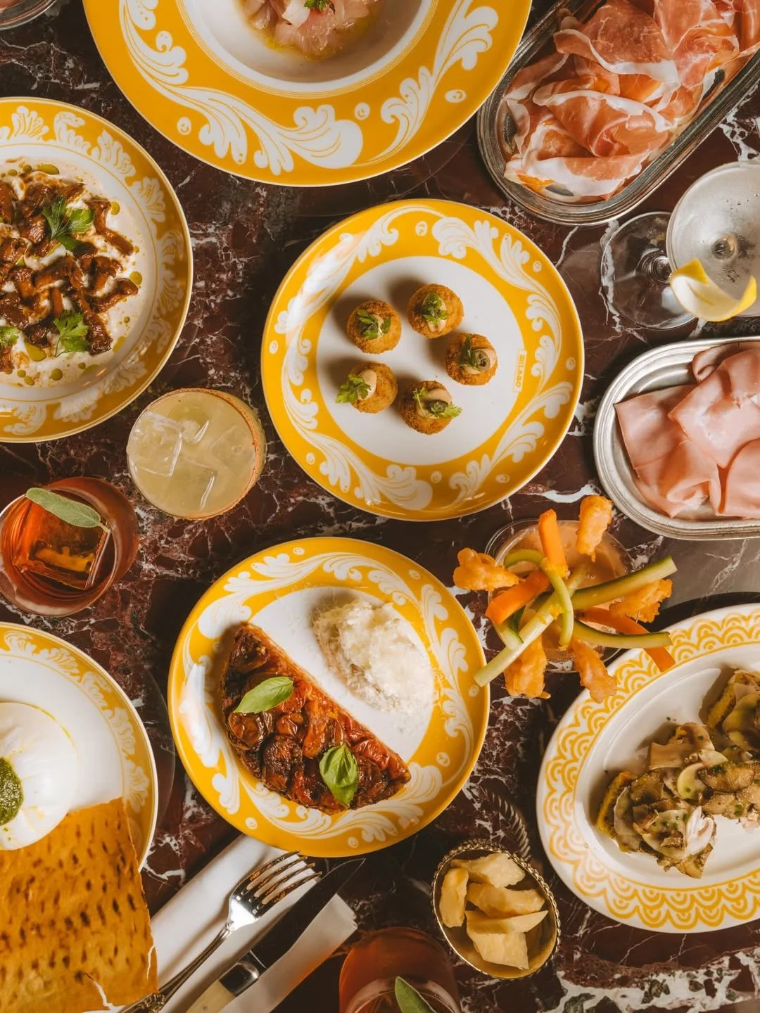 shared-italian-dishes-generous-portions-table-setting