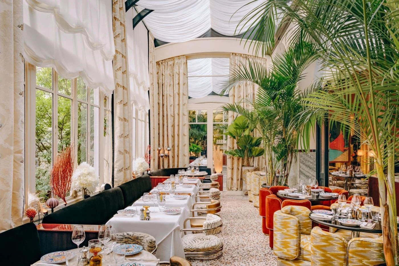 green-restaurant-interior-plant-filled-space-natural-textures