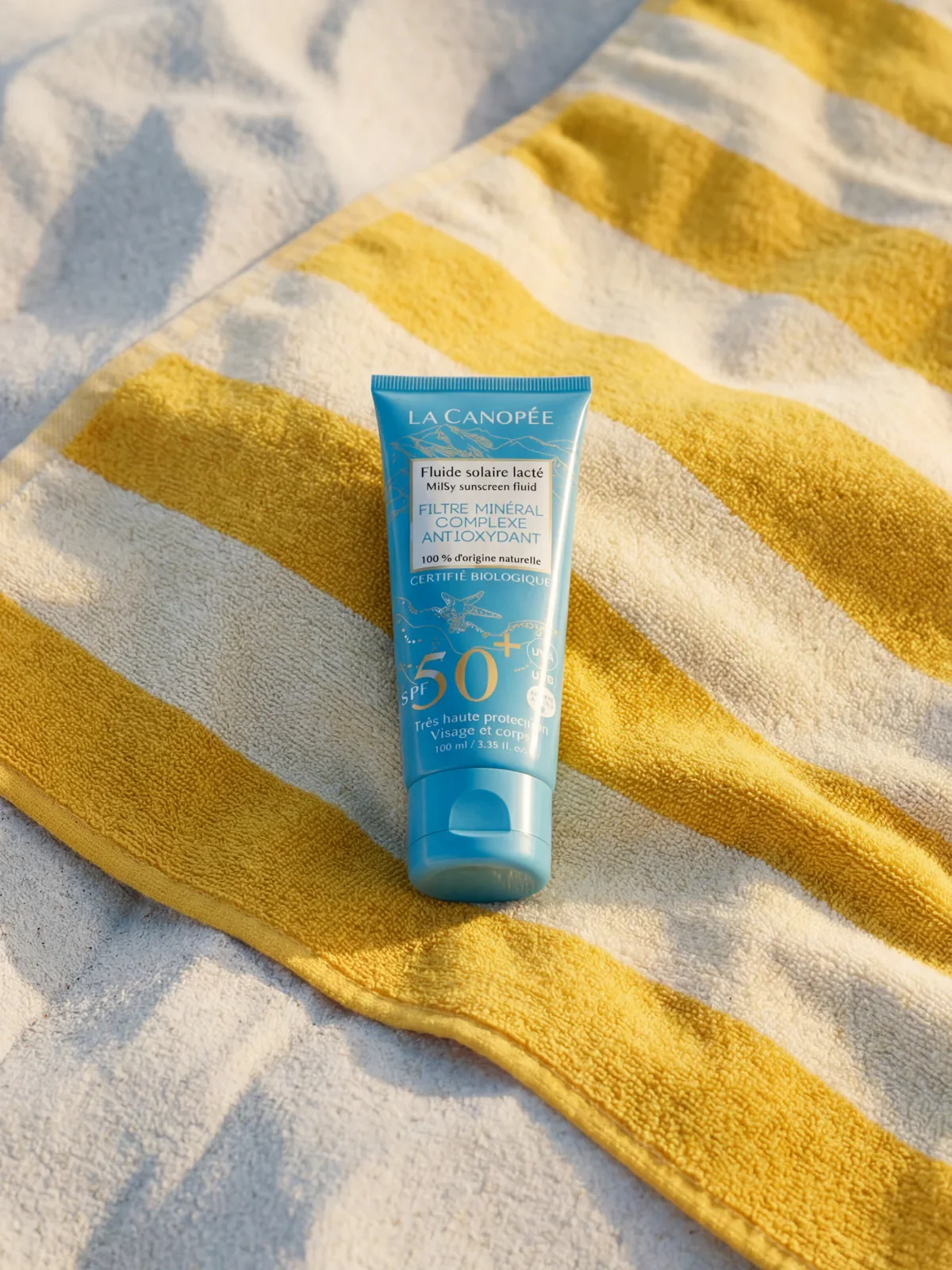 la-canopee-spf50-mineral-sunscreen-beach-flatlay