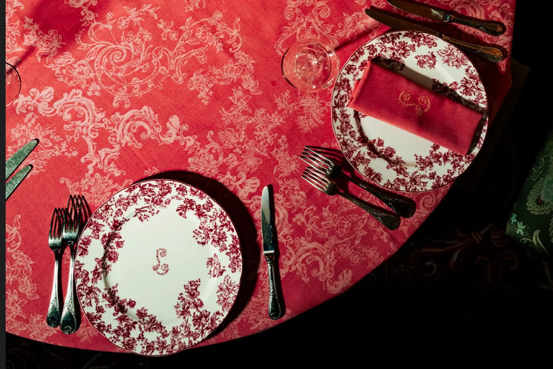 A close-up of a diamond ring held up to the light inside Lapérouse Paris, referencing the legendary Belle Époque tradition of courtesans scratching the salon mirrors to verify their stones.