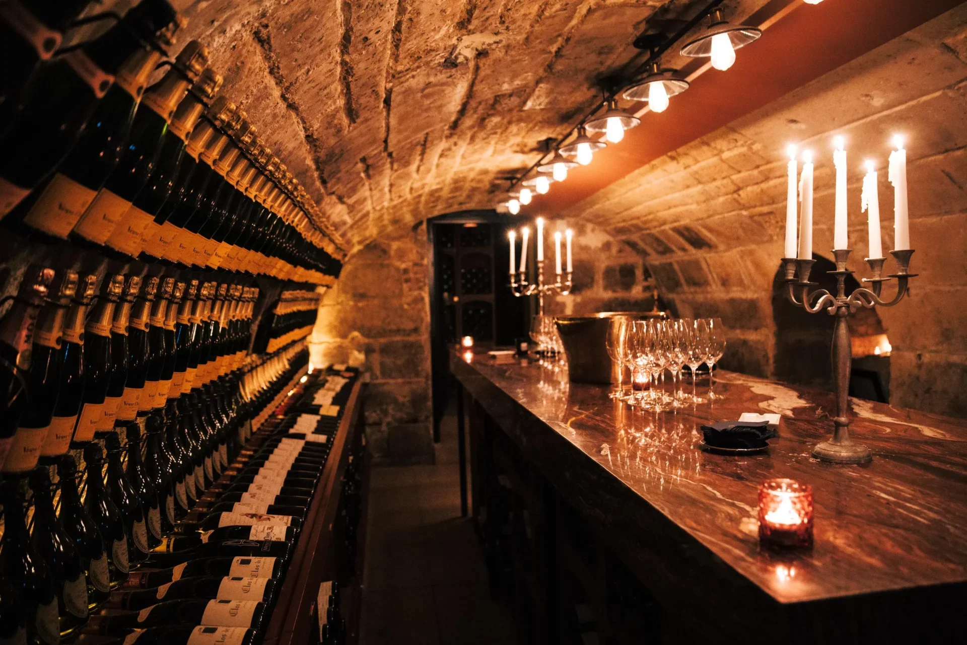 laperouse-paris-historic-wine-cellar-champagne-candelabra-stone-vault