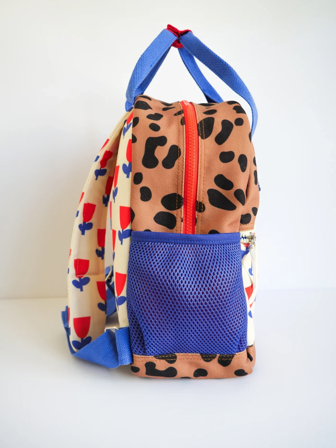 mini-kyomo-x-taxi-brousse-backpack-side.webp