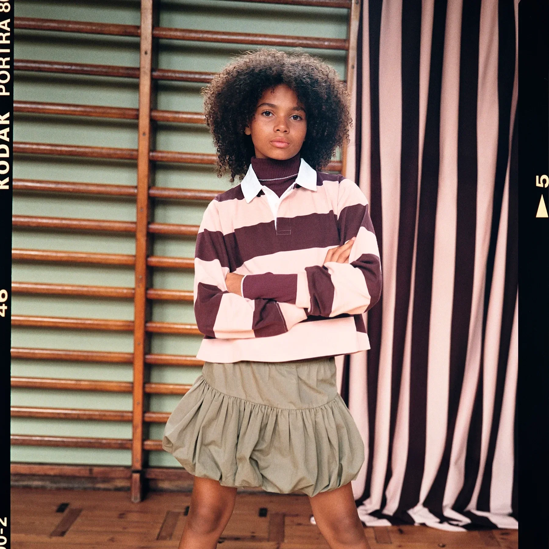 mole-pink-burgundy-striped-polo.webp