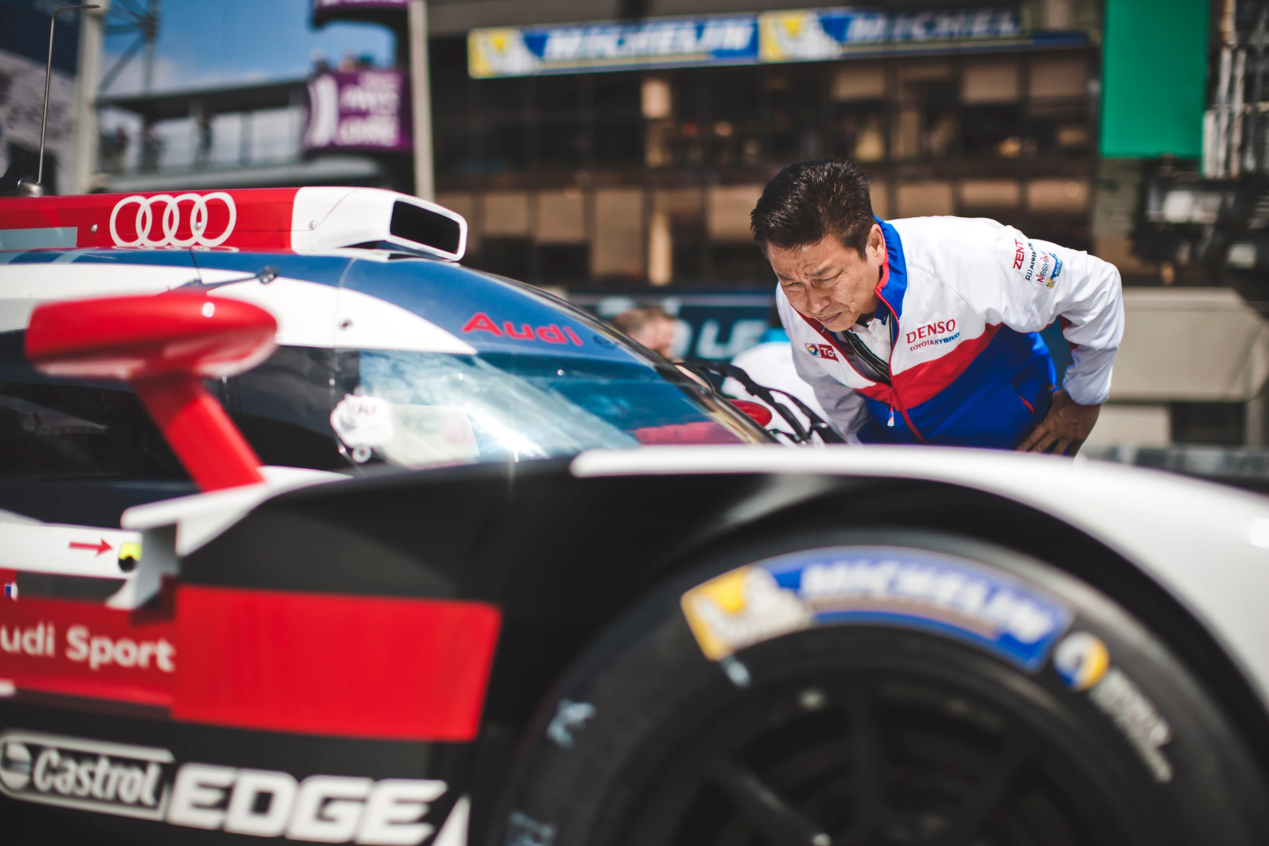 Toyota engineer studies the Audi R18 E-Tron Quattro