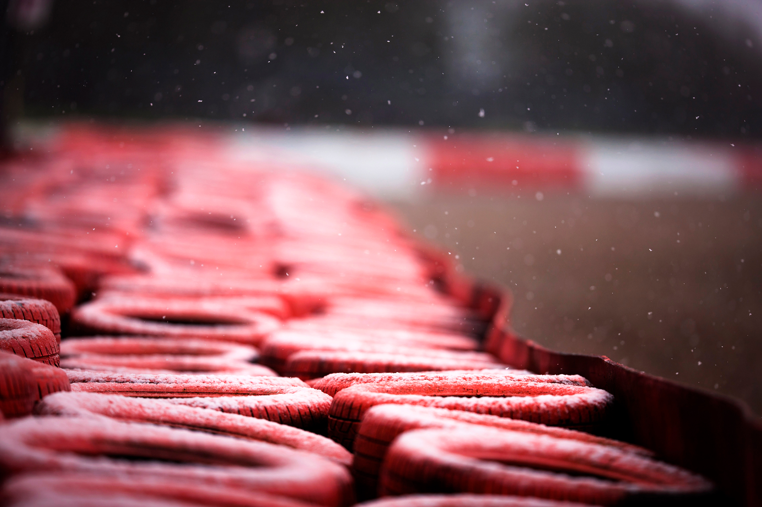 Snow falling on a tyre wall