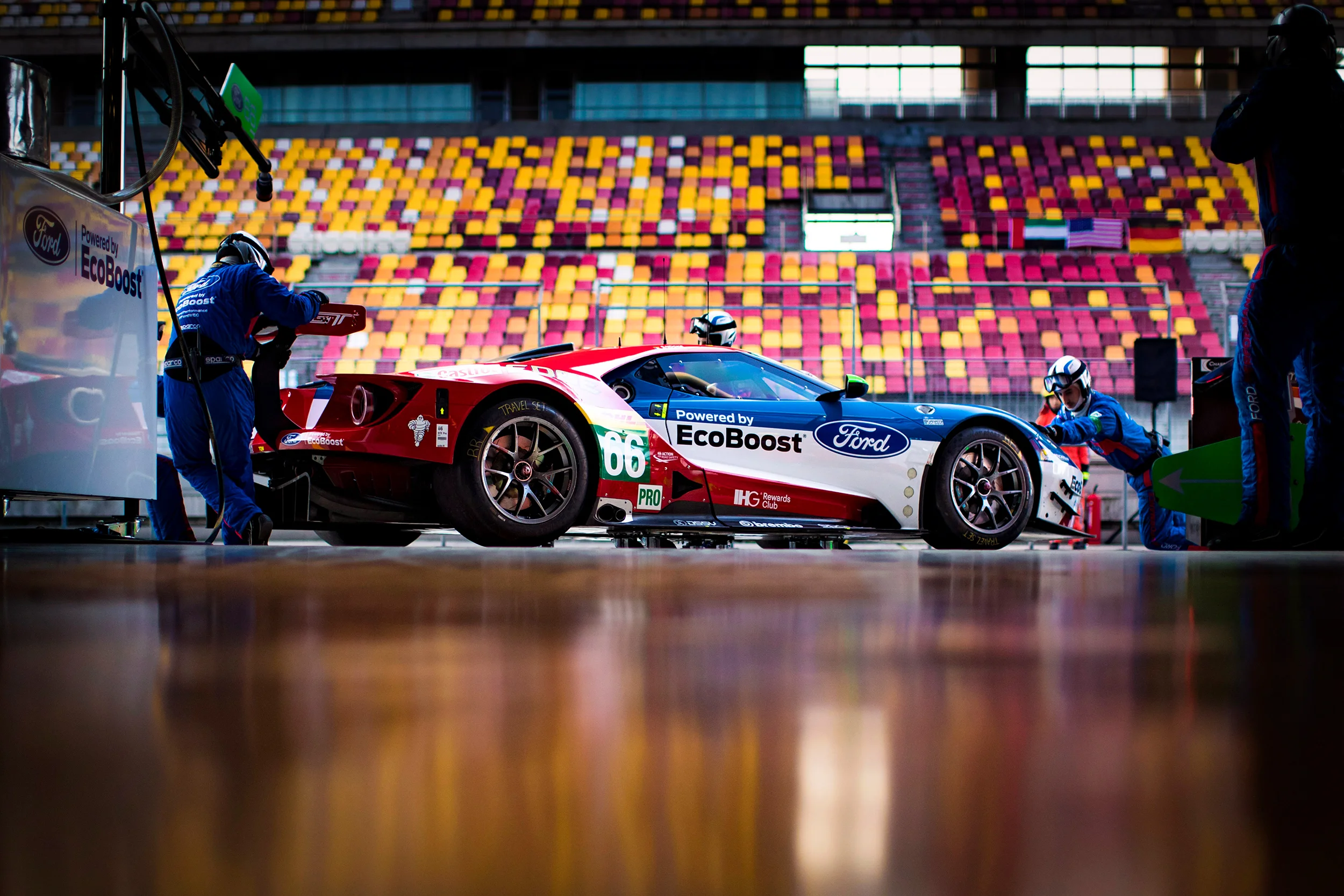 #66 Ford GT is pushed into the pit lane by the Ford team