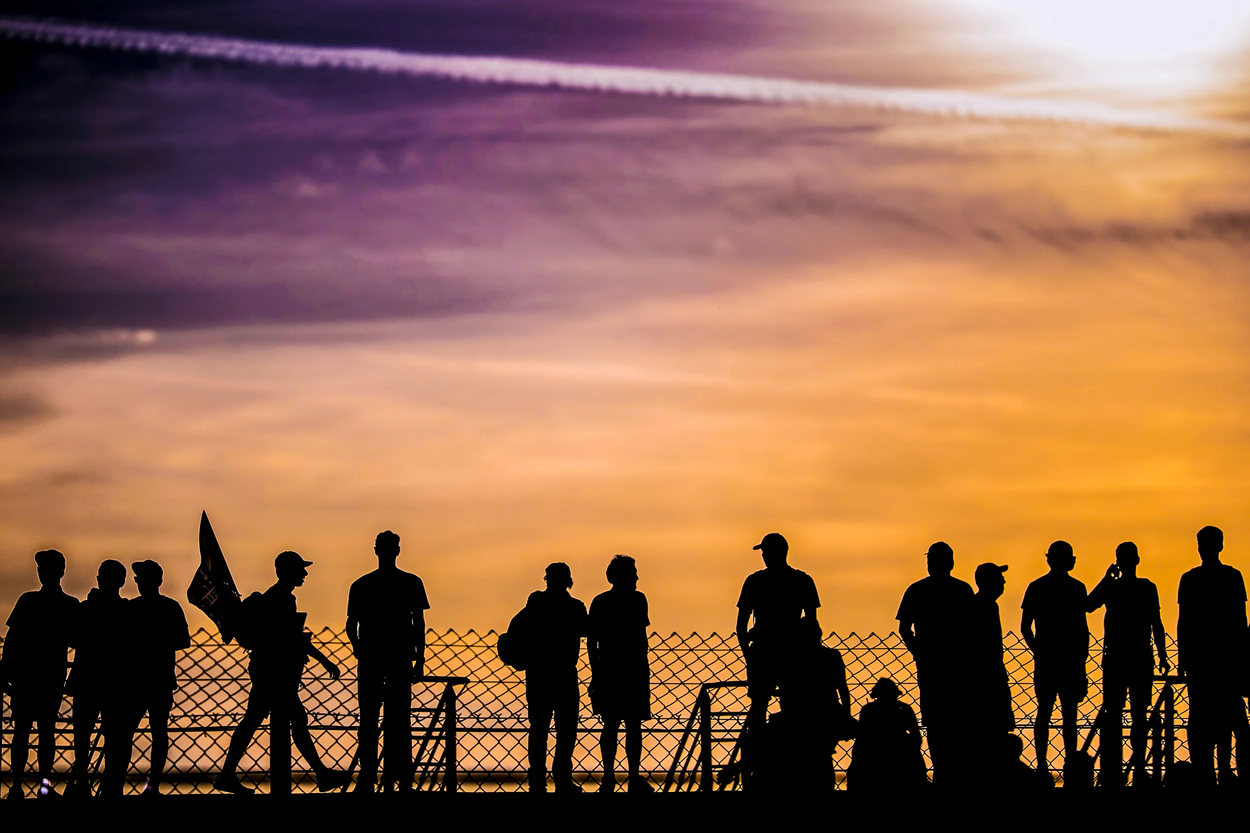 Spectators at sunset