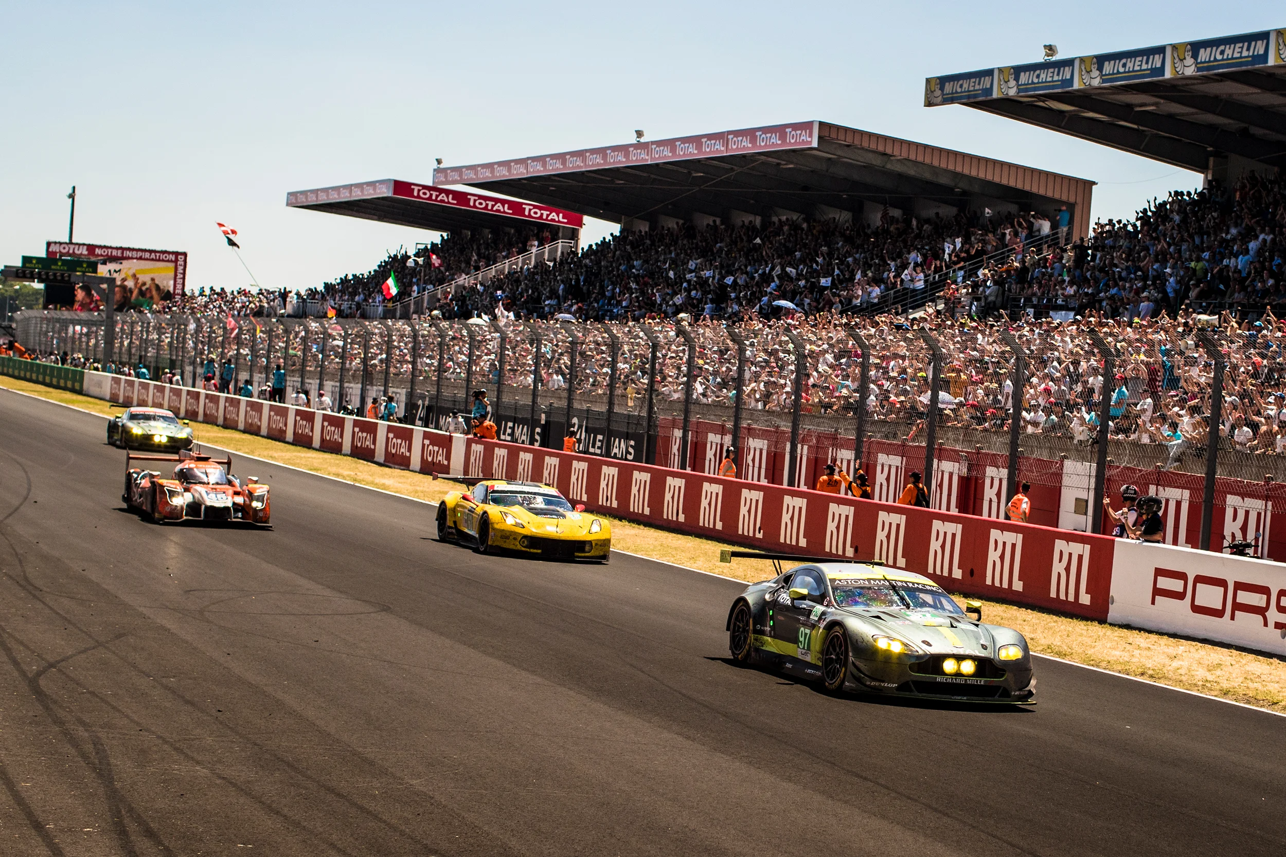 Jonny Adam, Aston Martin Vantage passes Jordan Taylor, Chevrolet Corvette C7.R for the lead in GTE Pro