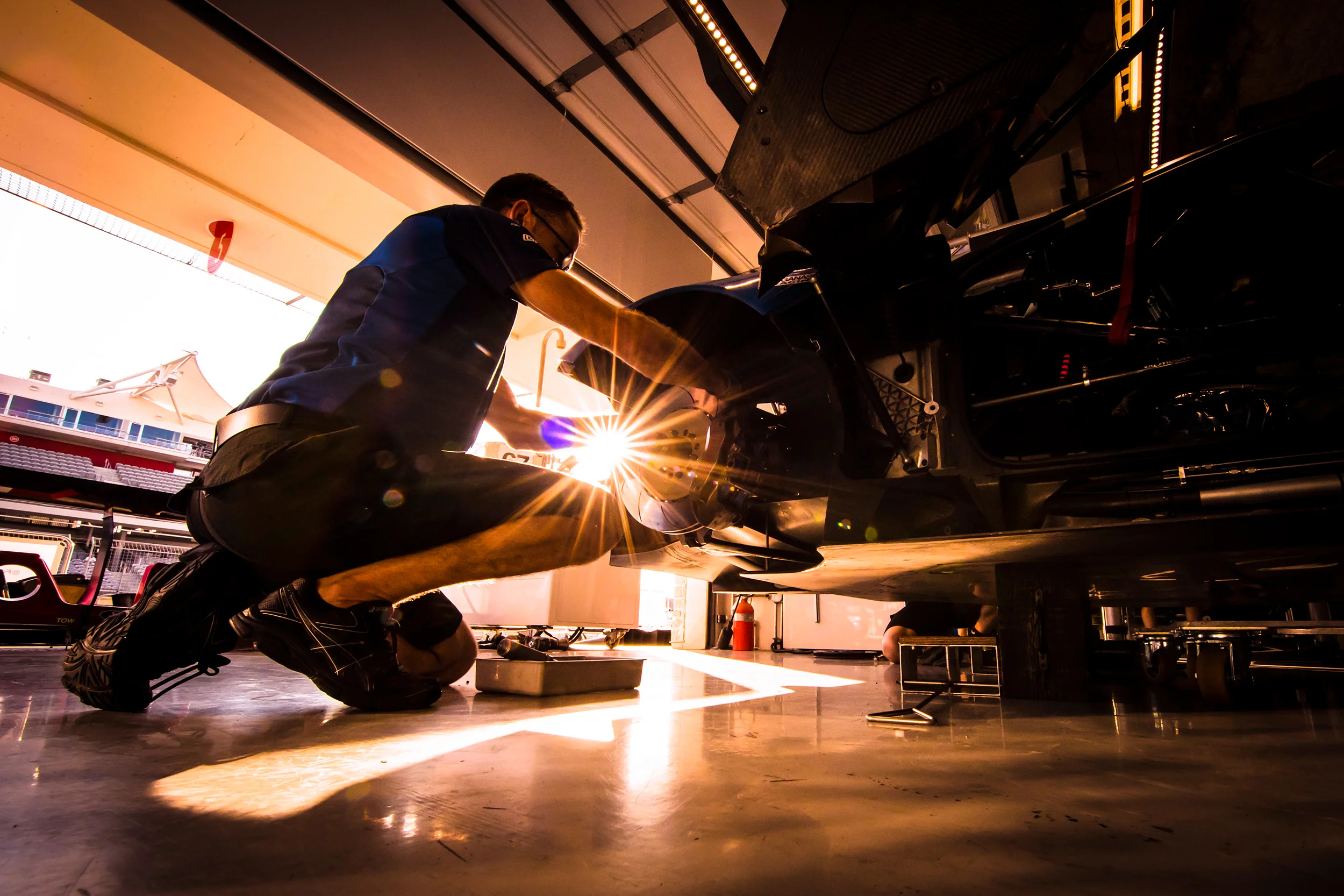 A team member works on the #67 Ford GT