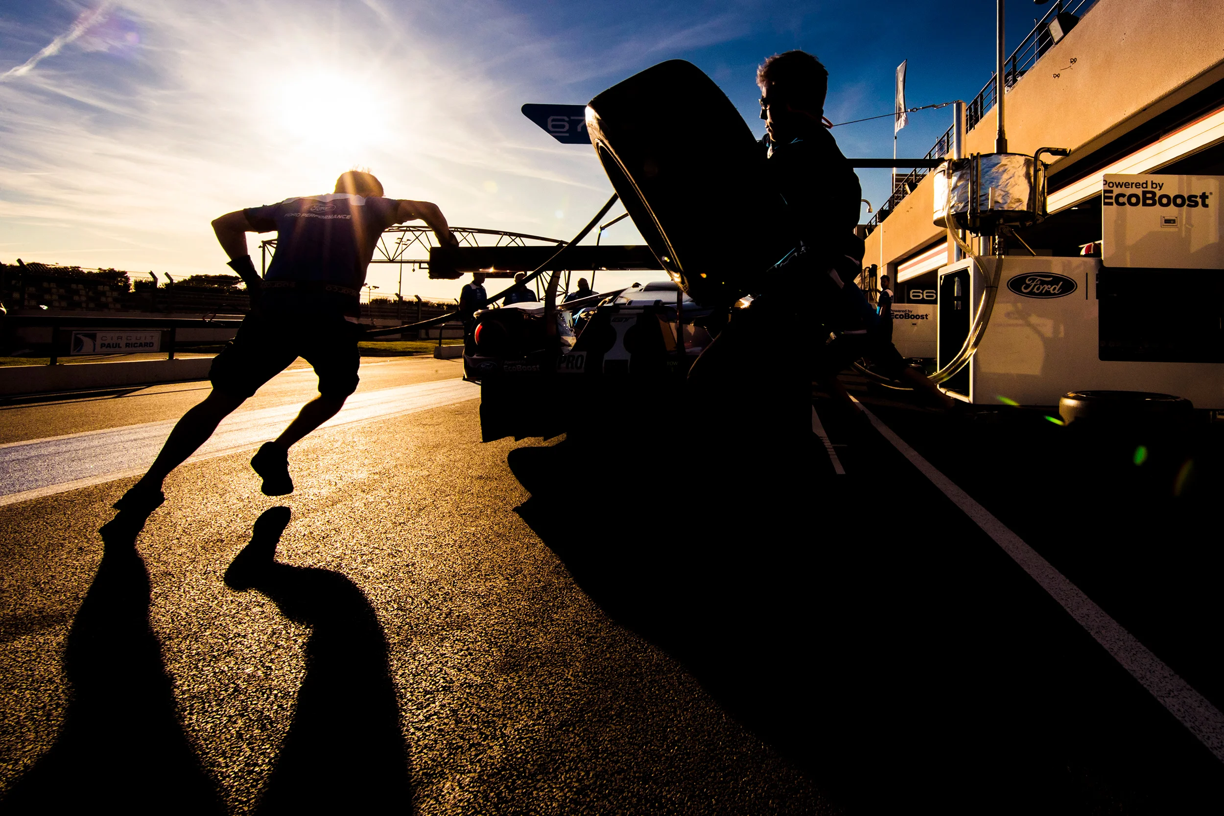 The Ford team practice a pit stop
