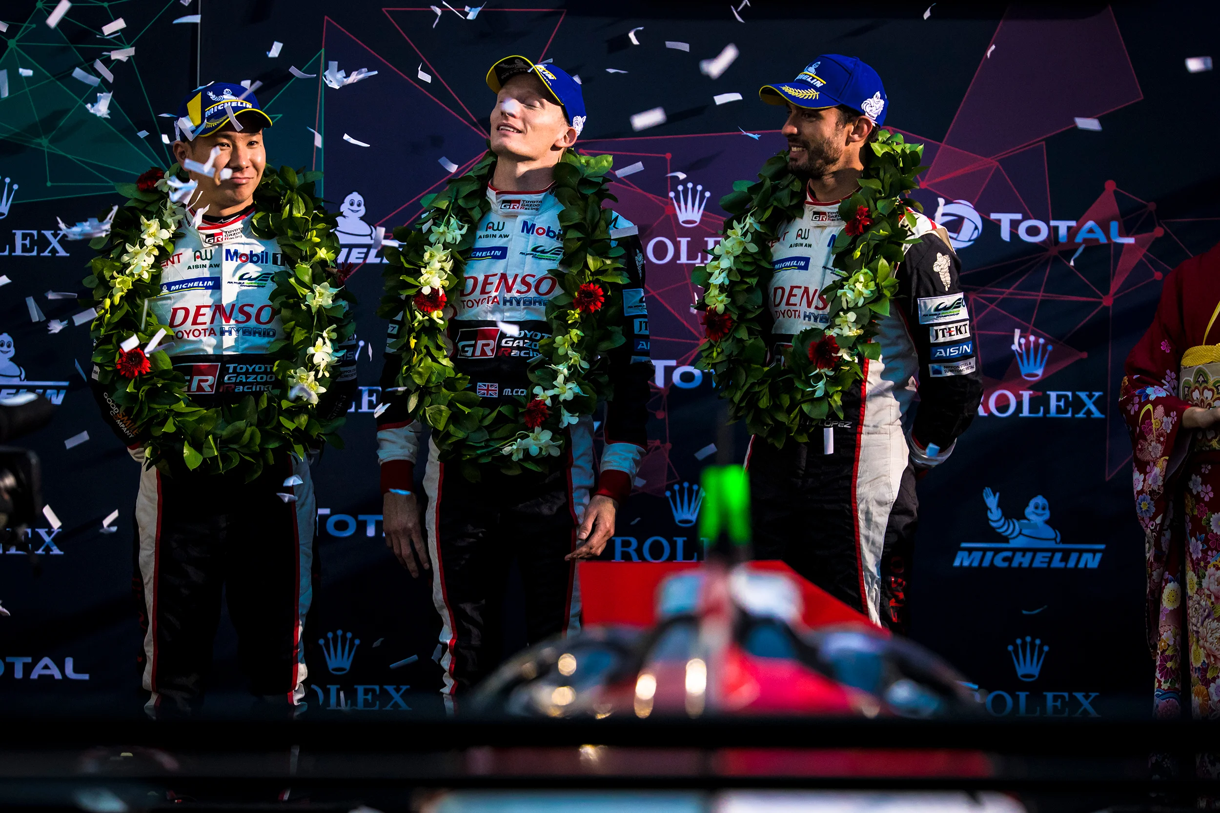 Kamui Kobayashi, Mike Conway and Jose Maria Lopez celebrate victory