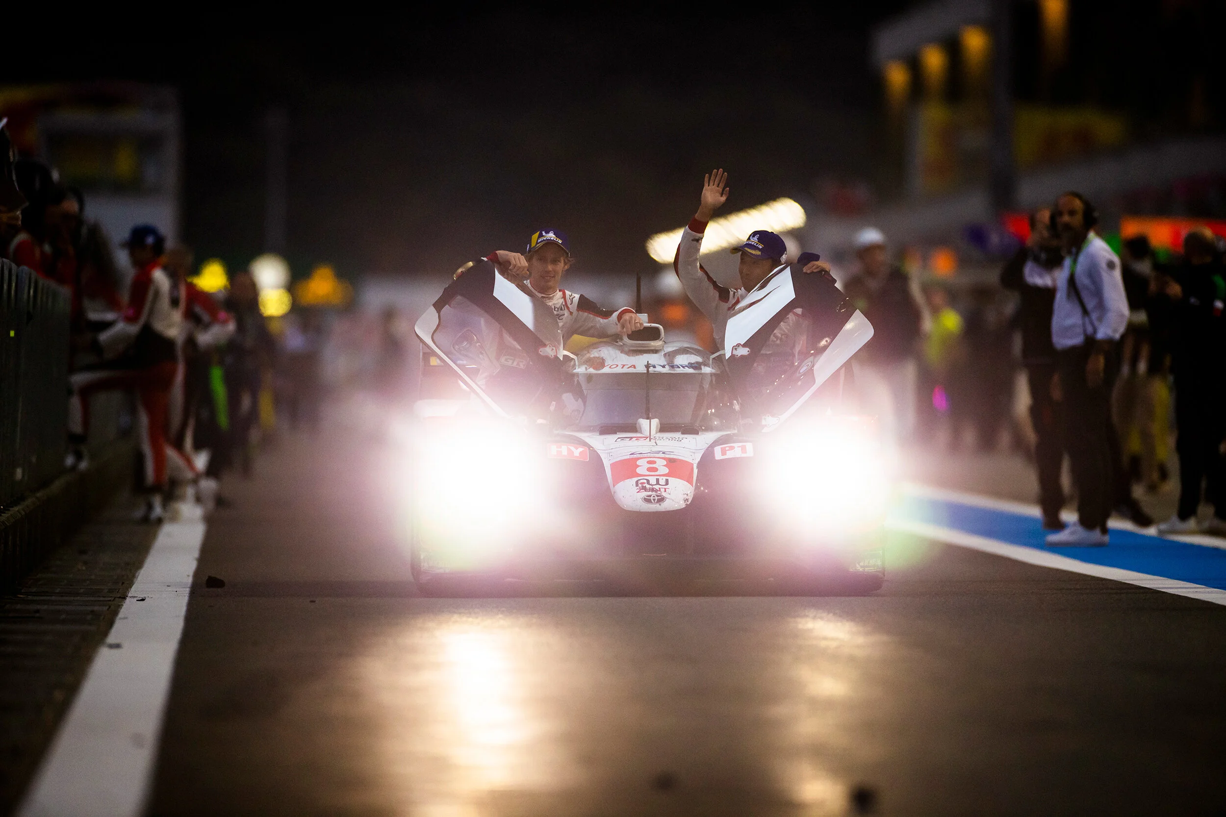 #8 Toyota drivers celebrate victory 