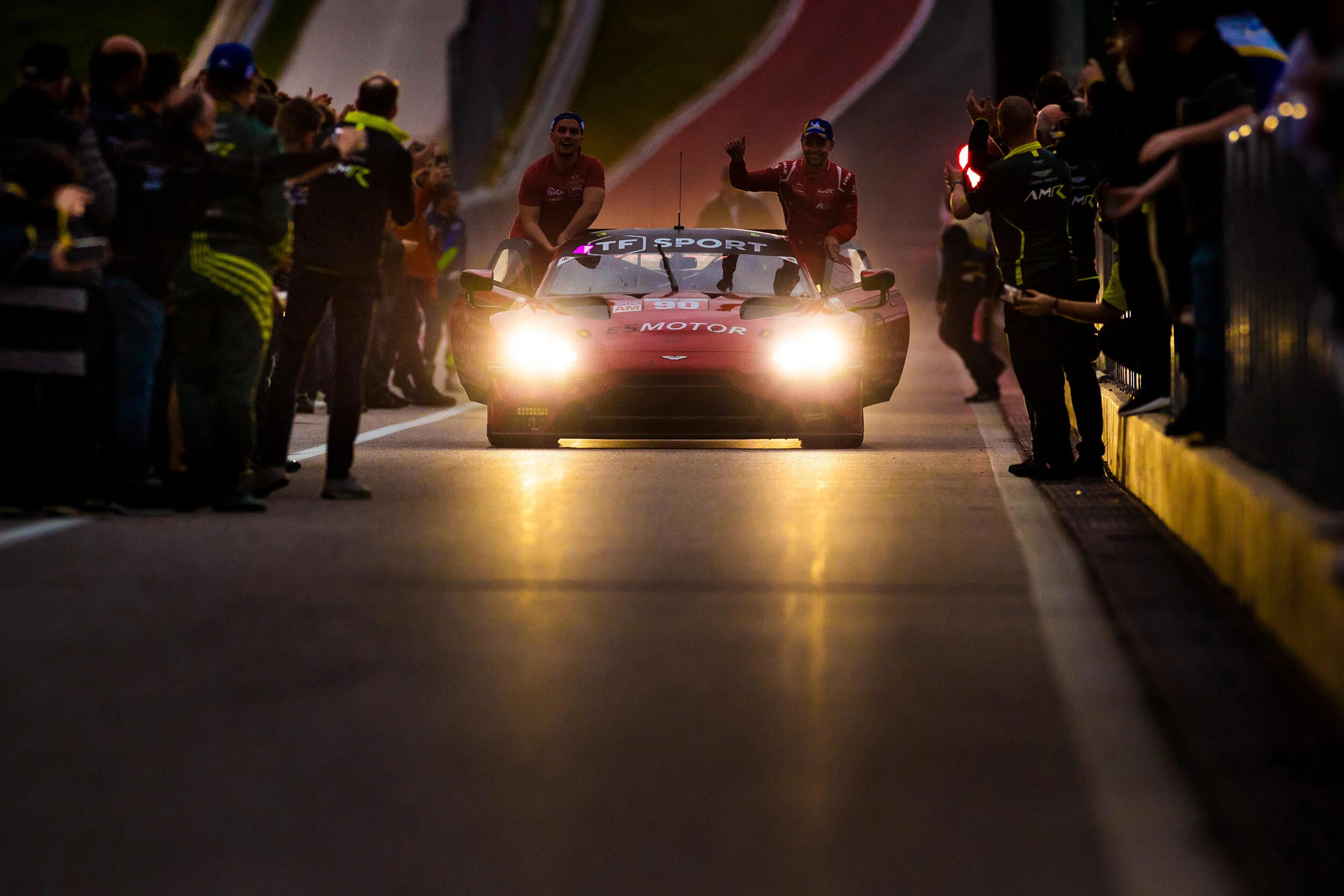 #90 TF Sport crew celebrate AM class victory 