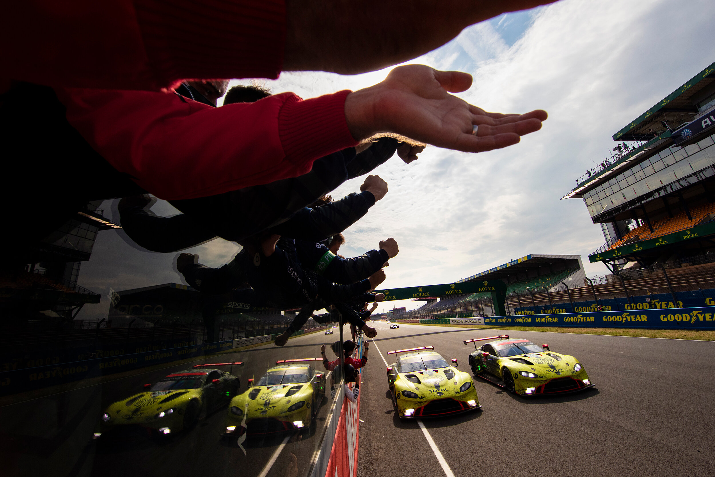 The Aston Martin team celebrate class victory  
