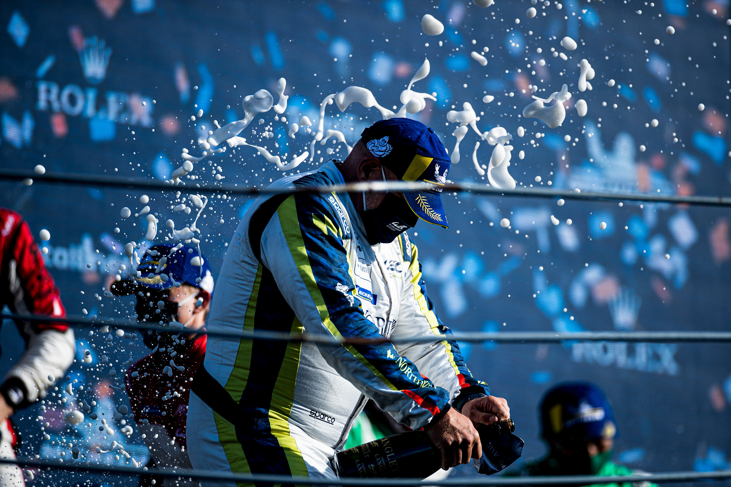 Paul Dalla Lana celebrates on the podium 