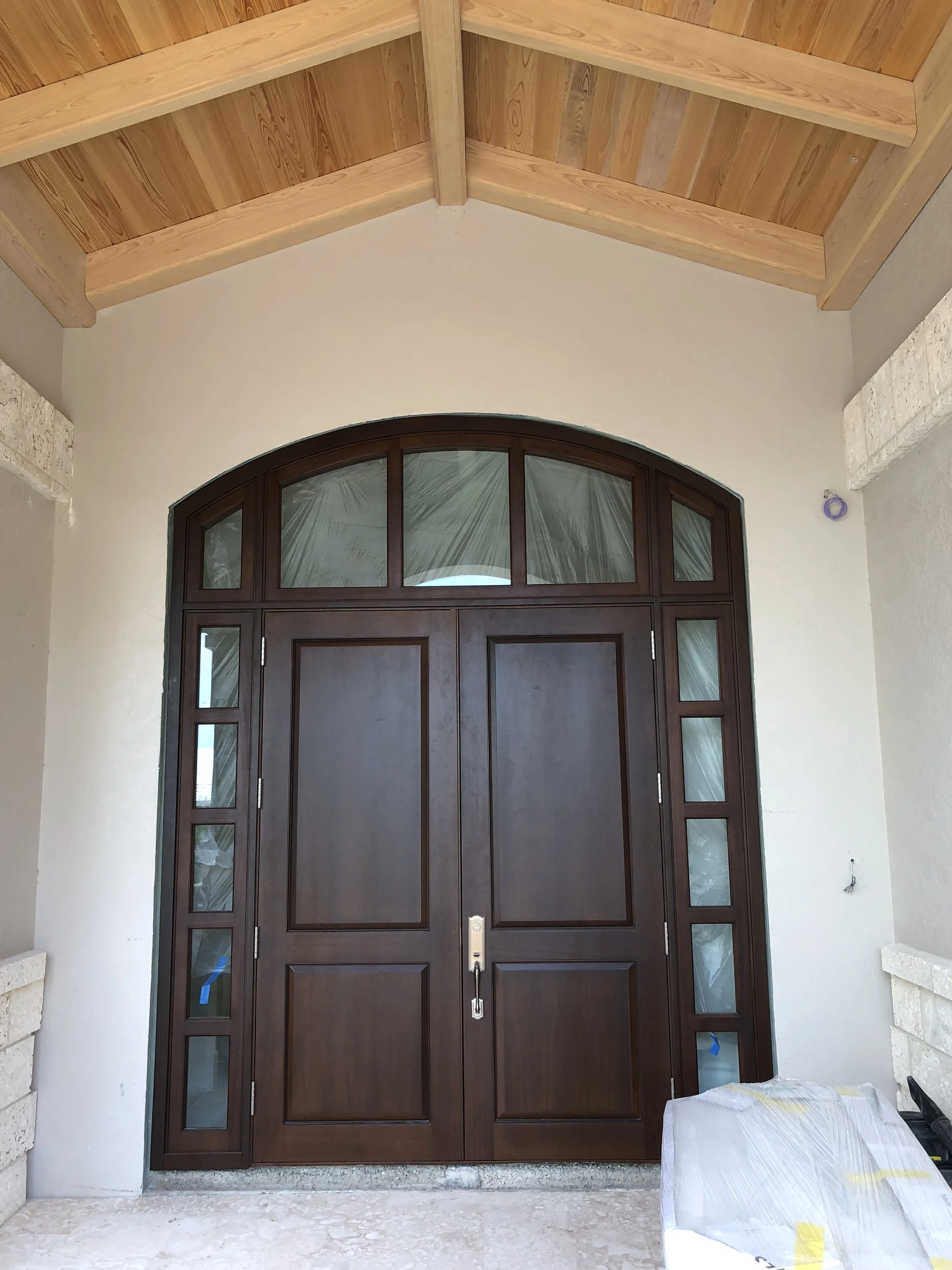 ENTRY DOORS WITH IMPACT GLASS SIDELIGHTS AND TRANSOM WITH SHIPLAP CEILING FOYER