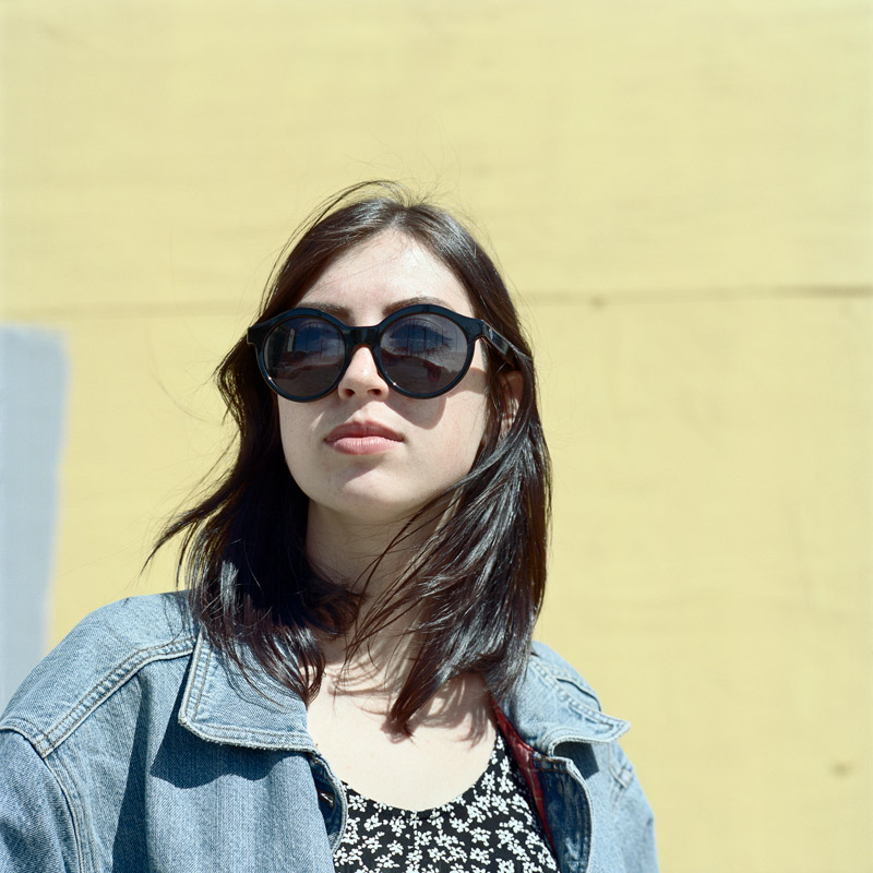 Portrait, Complimentary Colors, Yellow, Blue, Round Sunglasses, Oceanside, Denim Jacket, Southern California, USA, Hasselblad, Kodak Portra, Film, Medium Format Film