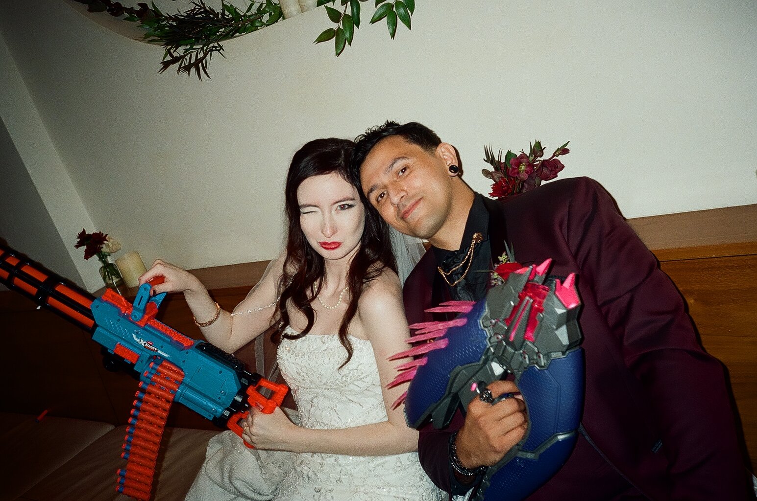 Nerf Guns, Nerf War, Red Roses, Maroon Tuxedo, Red lips, Wedding Dress, Gothic Wedding, Film, 35mm Film, Nikon, Santa Barbara, California