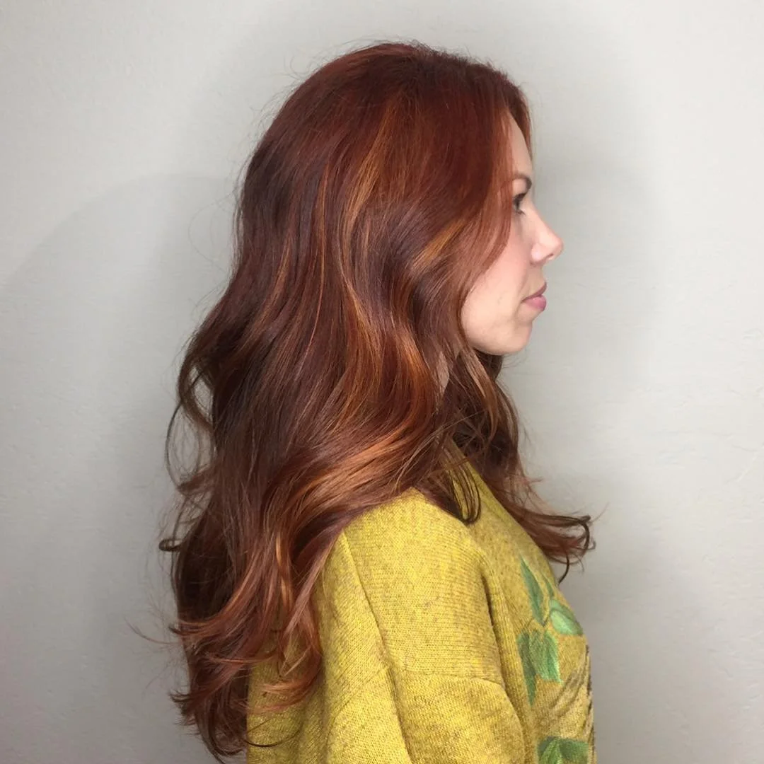 What would you call this color? Cinnamon? Pumpkin spice? #imreadytogobacktowork #rosedistrictbrokenarrow #hairstylist #brokenarrowsalon #copperhair #longhair #redhair #colorspecialist