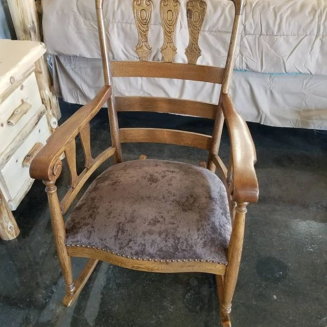 Antique rocker we just finished.  Refinished arms, reupholstered seat.  Glued and reinforced frame.