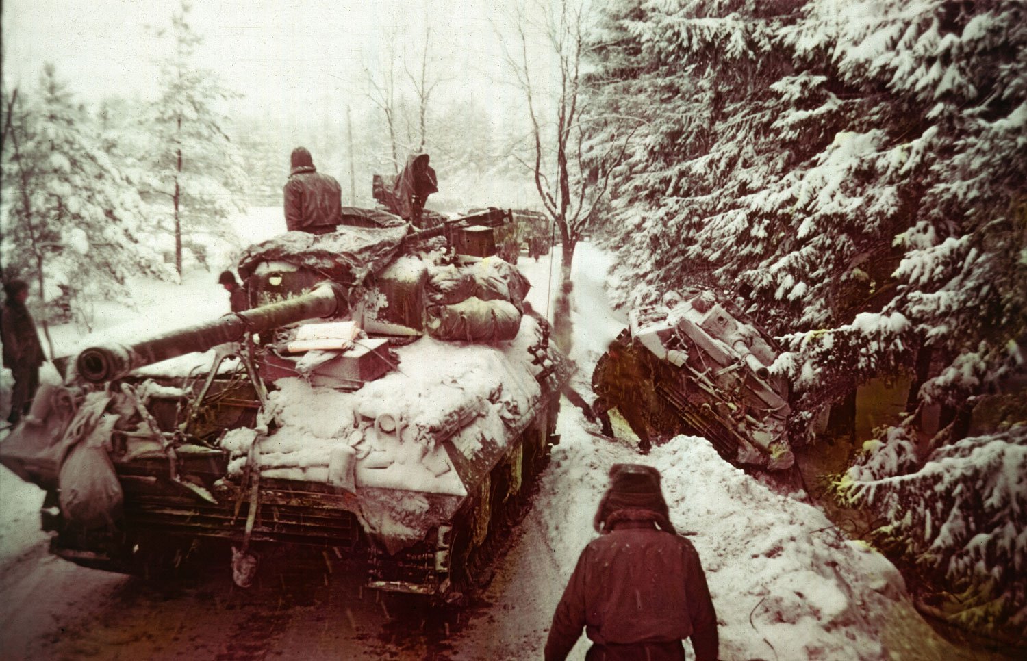 Under radio silence, MG Harmon's division made an epic 113 mile road march on treacherous ice-covered roads to engage German forces during the Battle of the Bulge, ultimately destroying its counterpart - the 2nd Panzer Division.