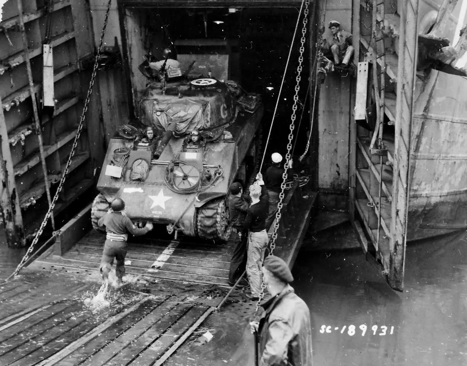2nd Armored Division M4 being loaded into a LST, 8 Jun 1944.