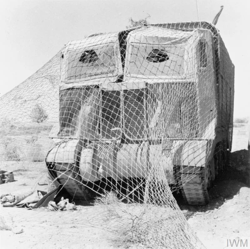 A Grant tank wearing 'Sun Shield' lorry camouflage in the Western Desert, May 1942. IWM photo E 12291