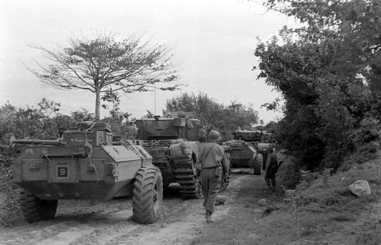 Assault force moving on Fort Montbarey. Sep 1944.