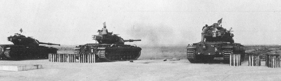 Conqueror Mk 2 tanks of 11th Hussars on a firing range in Germany. 