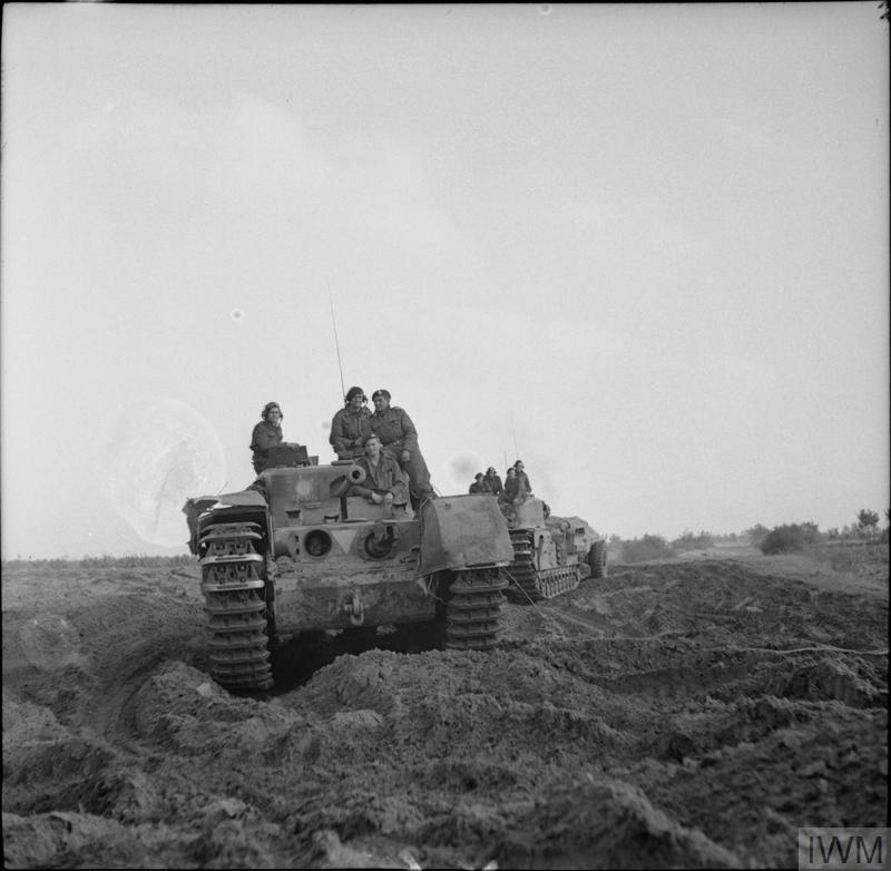 Churchill Crocodile tanks move into position during the attack towards Hertogenbosch, 23 Oct 1944. IWM photo B 11140.