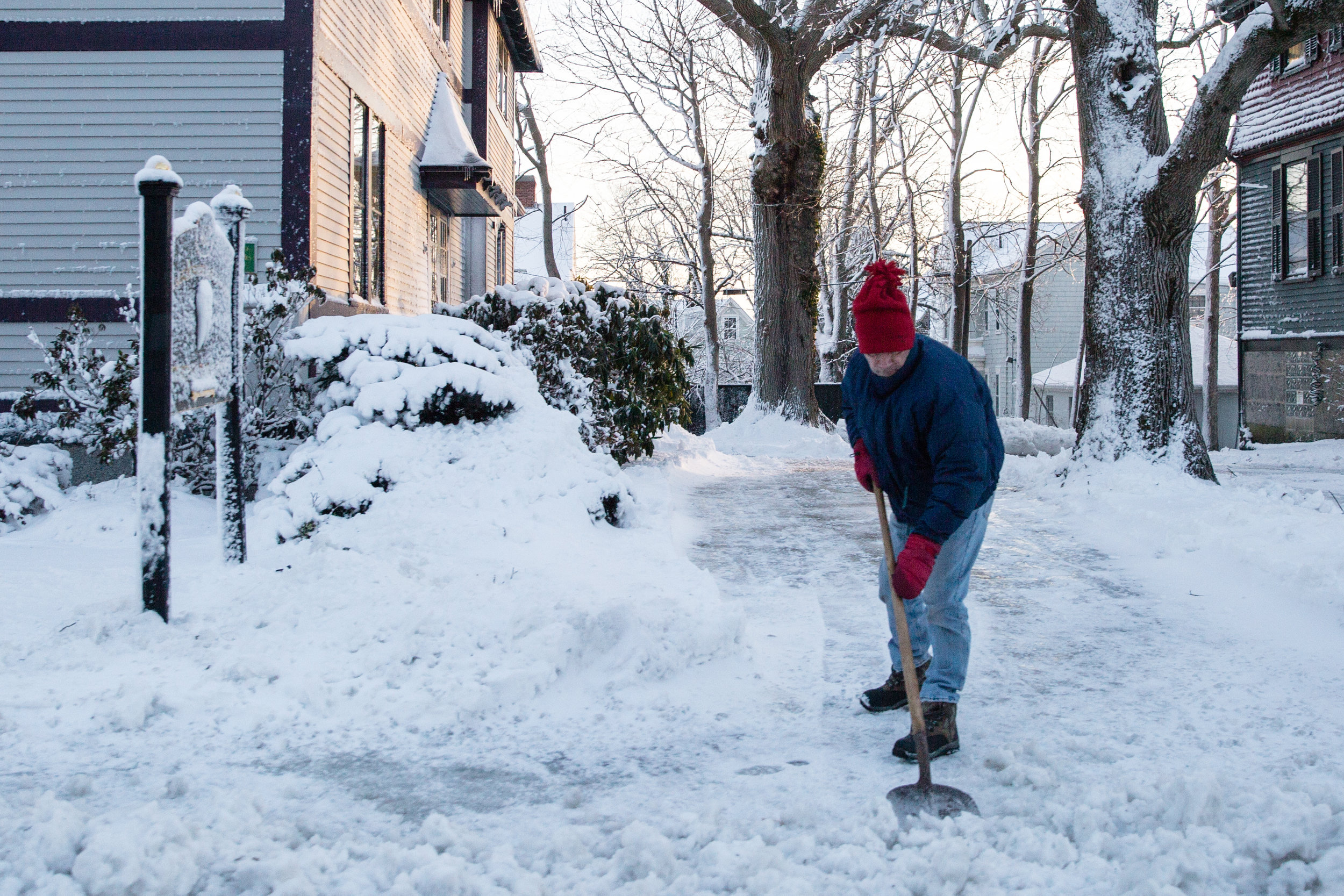  A man shovels snow after the storm. - Dartmouth, MA 