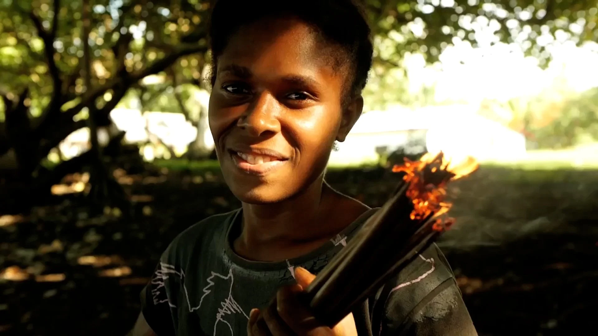 Village community group collaborating on sustainability initiative filmed for international aid organisation