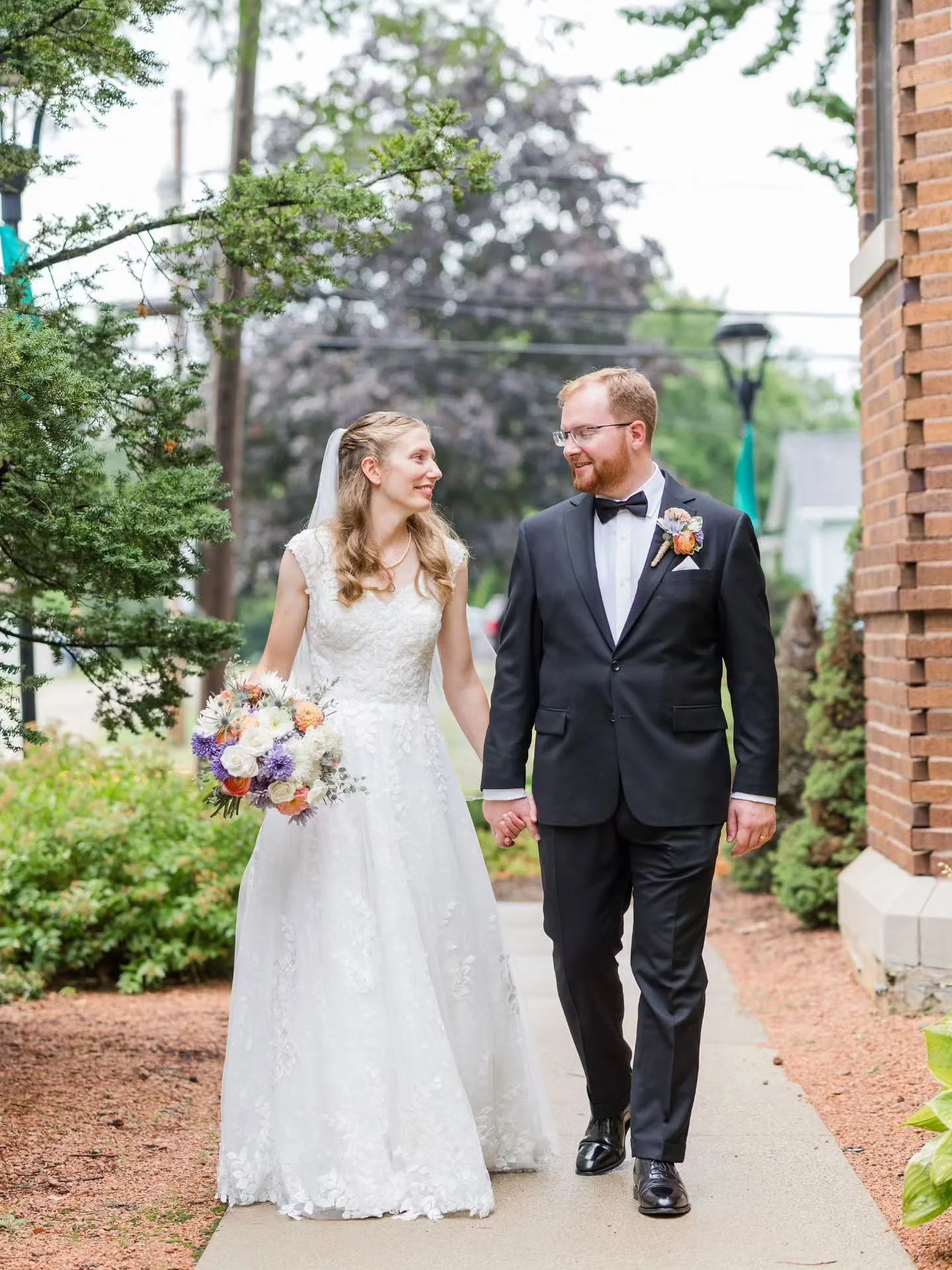 Congratulations to the Mueller's! Such a beautiful Nuptial Mass at Sacred Hearts of Jesus and Mary! The rain lightened up just enough to get some outdoor portraits at McCarthy. (Part 1)