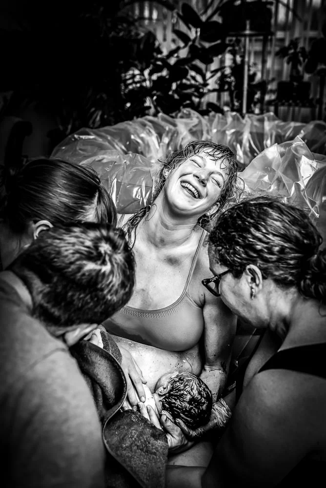 The moment a mother finds out that the baby she just birthed is her first boy is such a joy to photograph.jpg