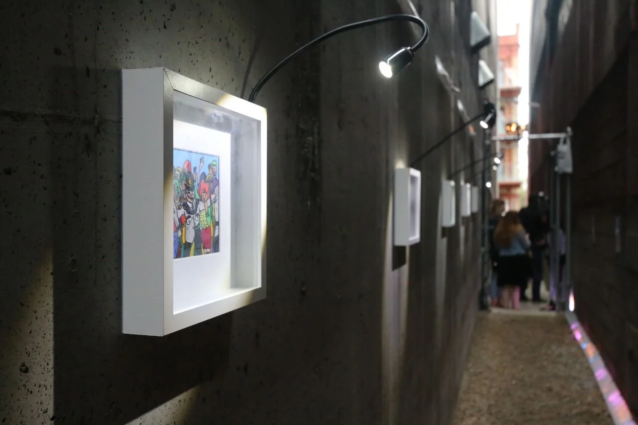  Secret Alley Gallery  created with Leslie Bush and Shannon Leblanc.&nbsp;  The concept takes a residual urban space and creates a unique and discoverable alley art gallery themed: Eyes on the Street. This one time delivery of small scale artwork wil