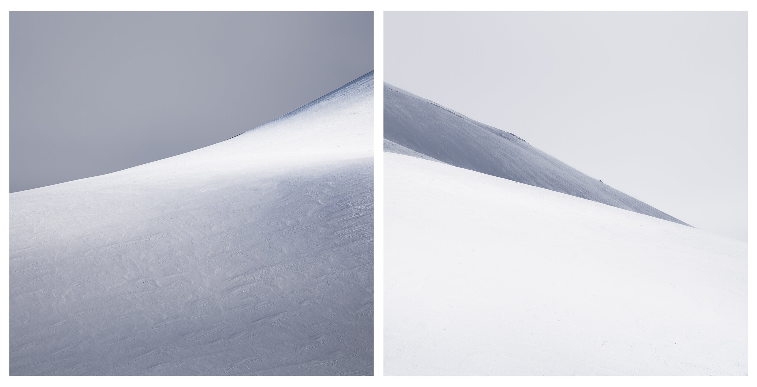  Snow creates a neutral palette curving over the landscape of the interior of Iceland in the winter. Light breaks through the clouds, placing a spotlight on a slope, a hollow, a valley. The snow not caught in its beam recedes into shadow.  With a cha