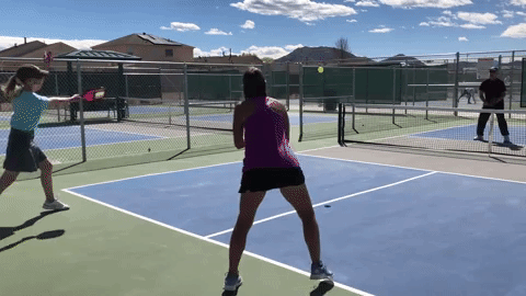 The player on the far side fails to cause trouble with this volley. The women play two good neutralizing drops , which gives them a relatively safe opportunity to move forward. Note that both drops were crosscourt, which makes successful dropping more likely.